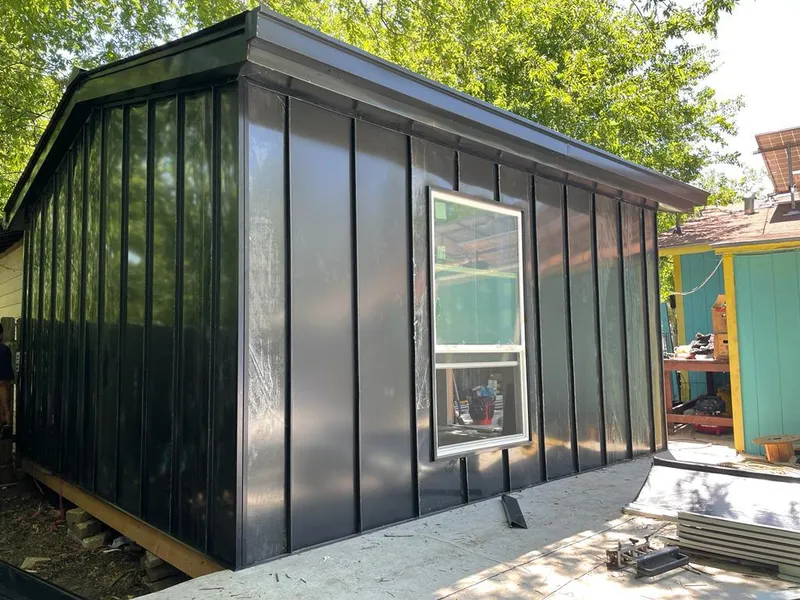 Black standing seam metal wall panels for Roof Inspection in Lexington